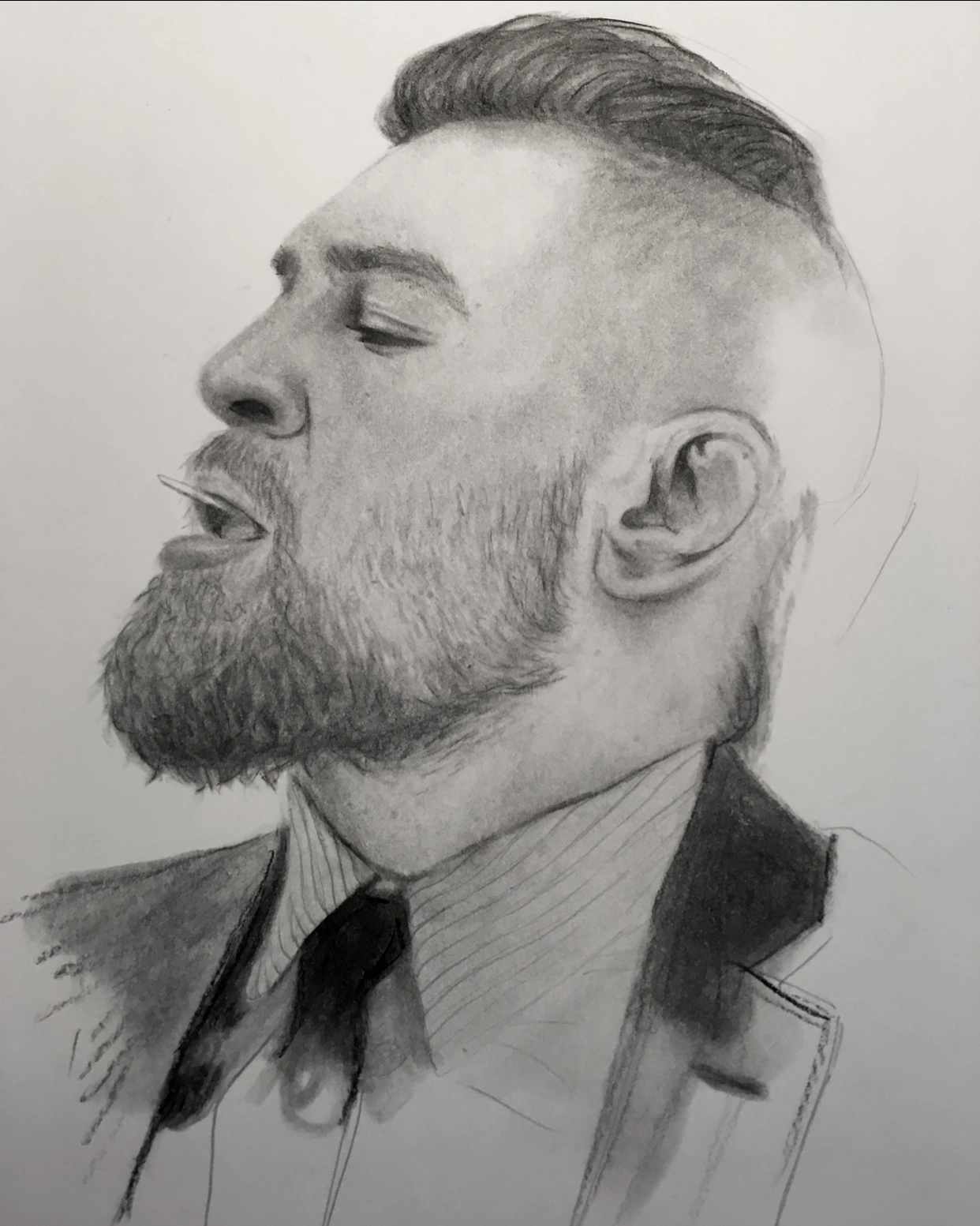 a charcoal drawing of Conor McGregor