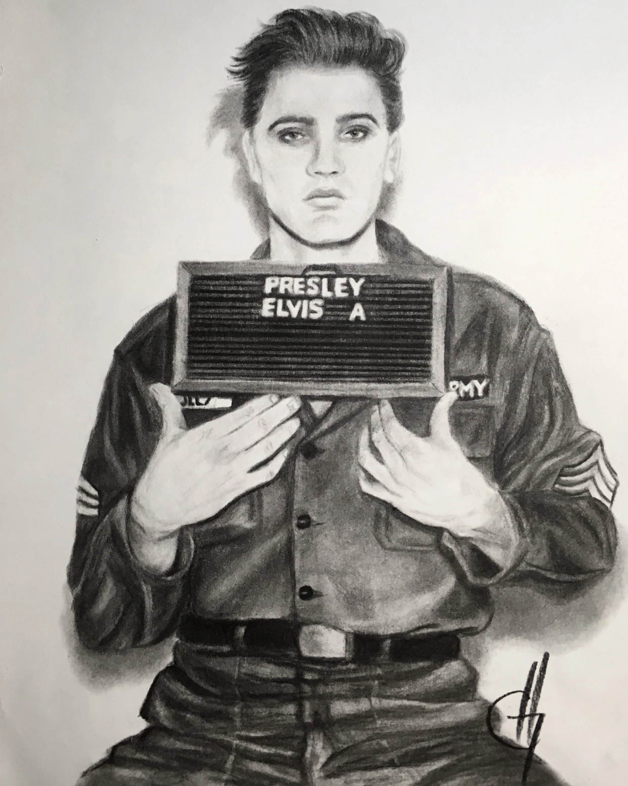 a charcoal drawing of Elvis Presley